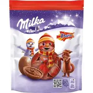 Шоколад Milka Daim молочний зі шматочками карамелі з мигдалем фігурний 86 г